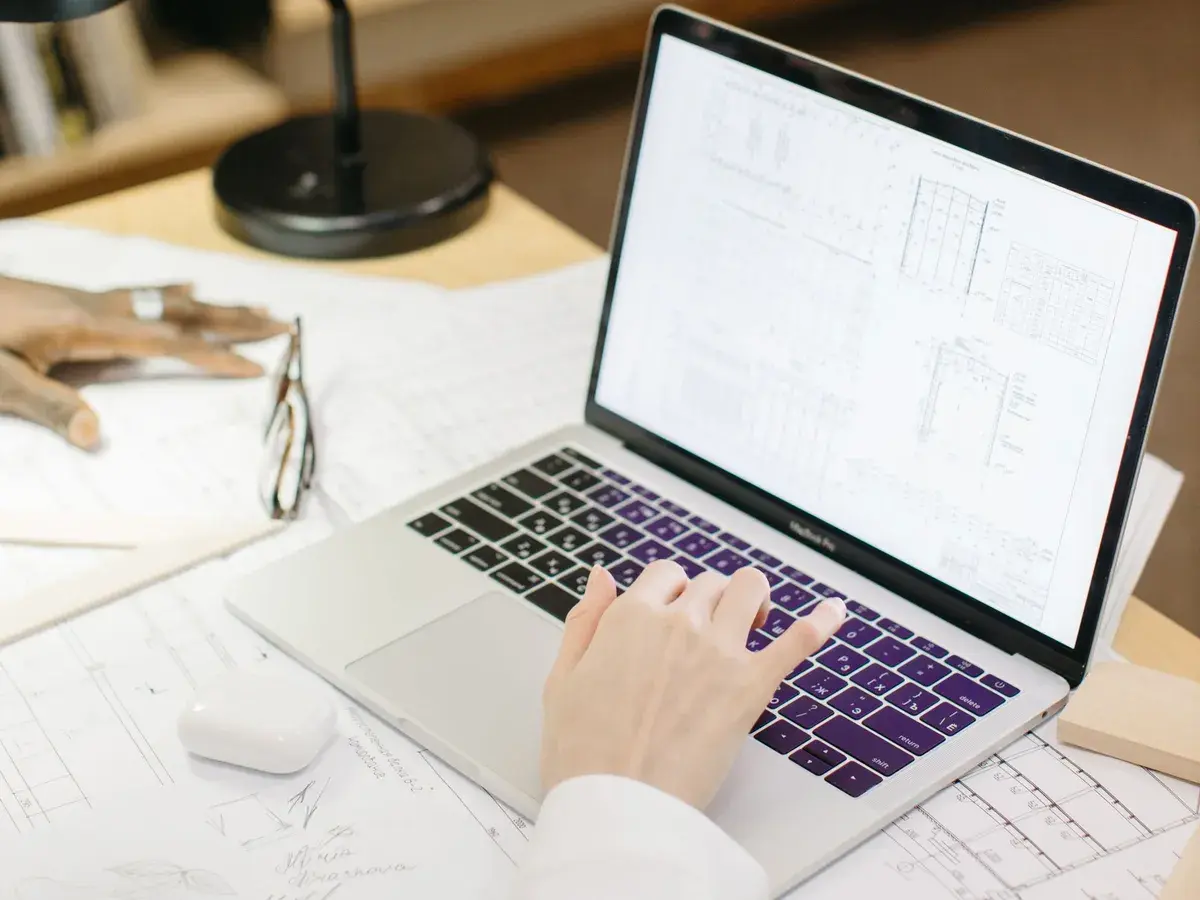 A laptop open on a screen full of structured product data.